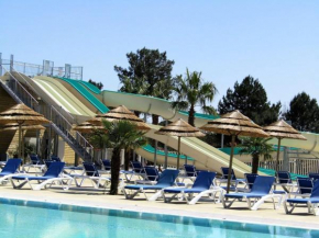 Bungalow de 3 chambres avec piscine partagee sauna et jardin a Saint Julien en Born C